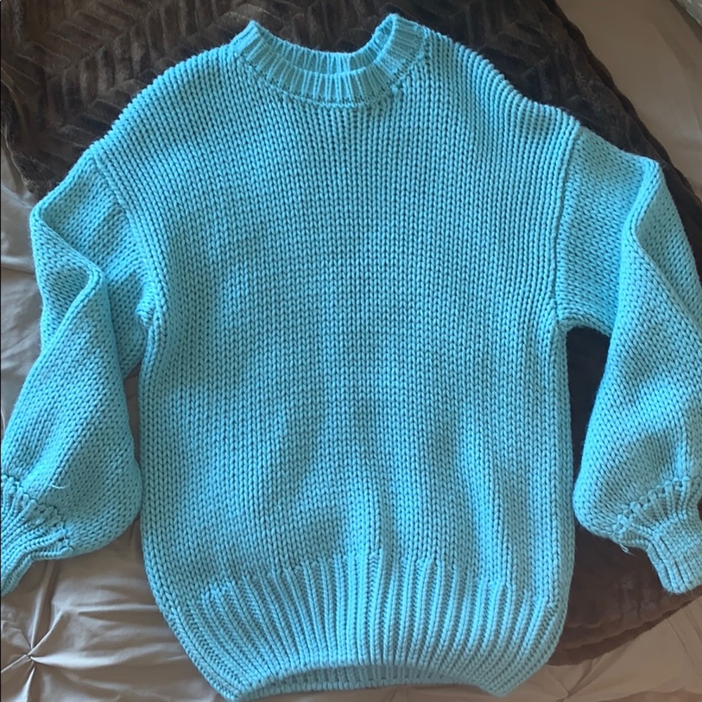 Light blue knitted sweater